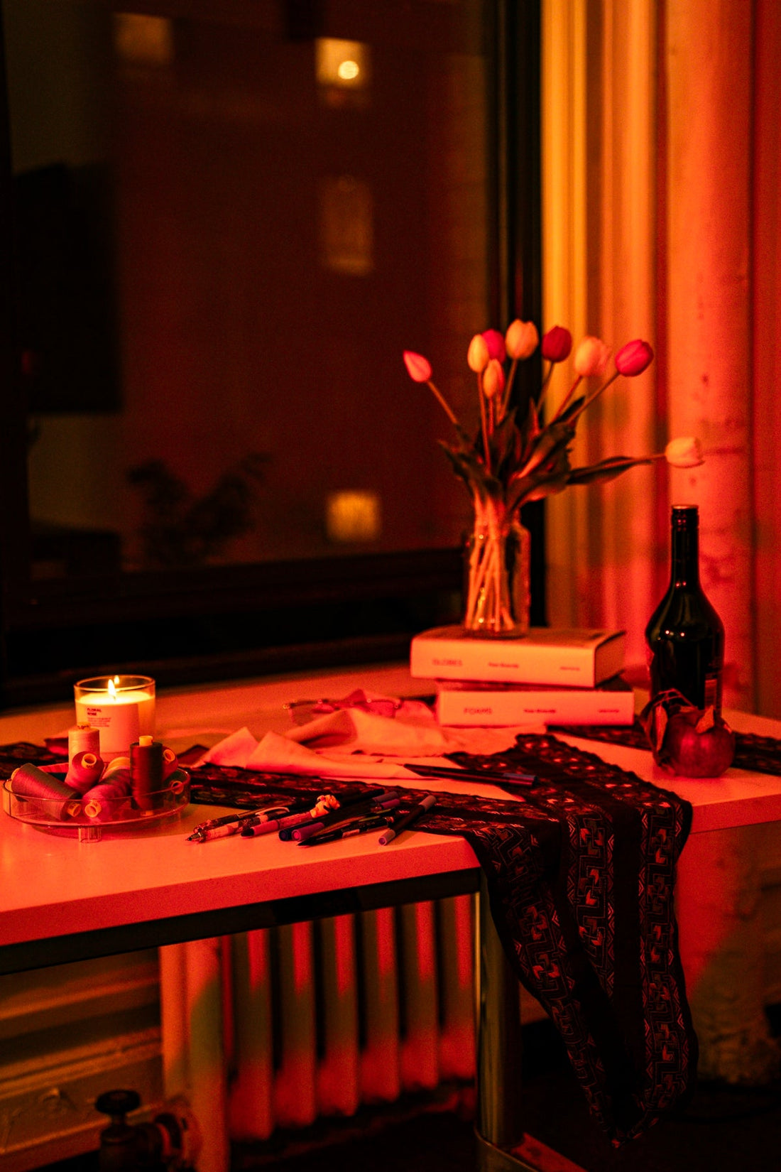 Tulips and wine bottle on a table
