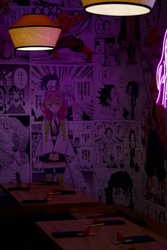 Anime manga wallpaper adorns a dimly lit restaurant interior.