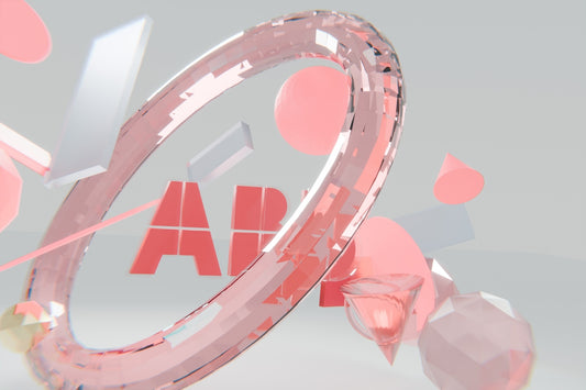Faceted pink ring, 'app' text, and abstract geometric shapes.