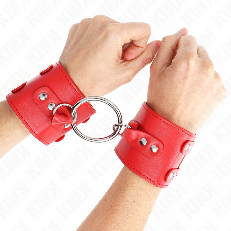 KINK - FIXED WRIST RESTRAINTS WITH RING AND STUDS ADJUSTABLE RED 17-22 CM X 6.5 CM - My naughty haven #