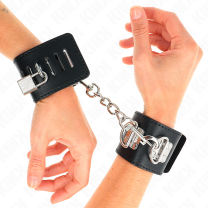 KINK - MULTIPOSITION WRIST RESTRAINTS WITH PADLOCK CLOSURE BLACK ADJUSTABLE 16-23 CM X 5.5 CM - My naughty haven #